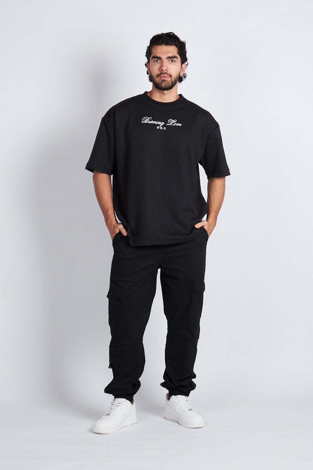 JOGGER CARGO CON PREENSES NEGRO - REDUX CLUB