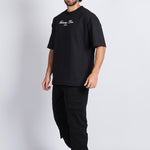 JOGGER CARGO CON PREENSES NEGRO - REDUX CLUB