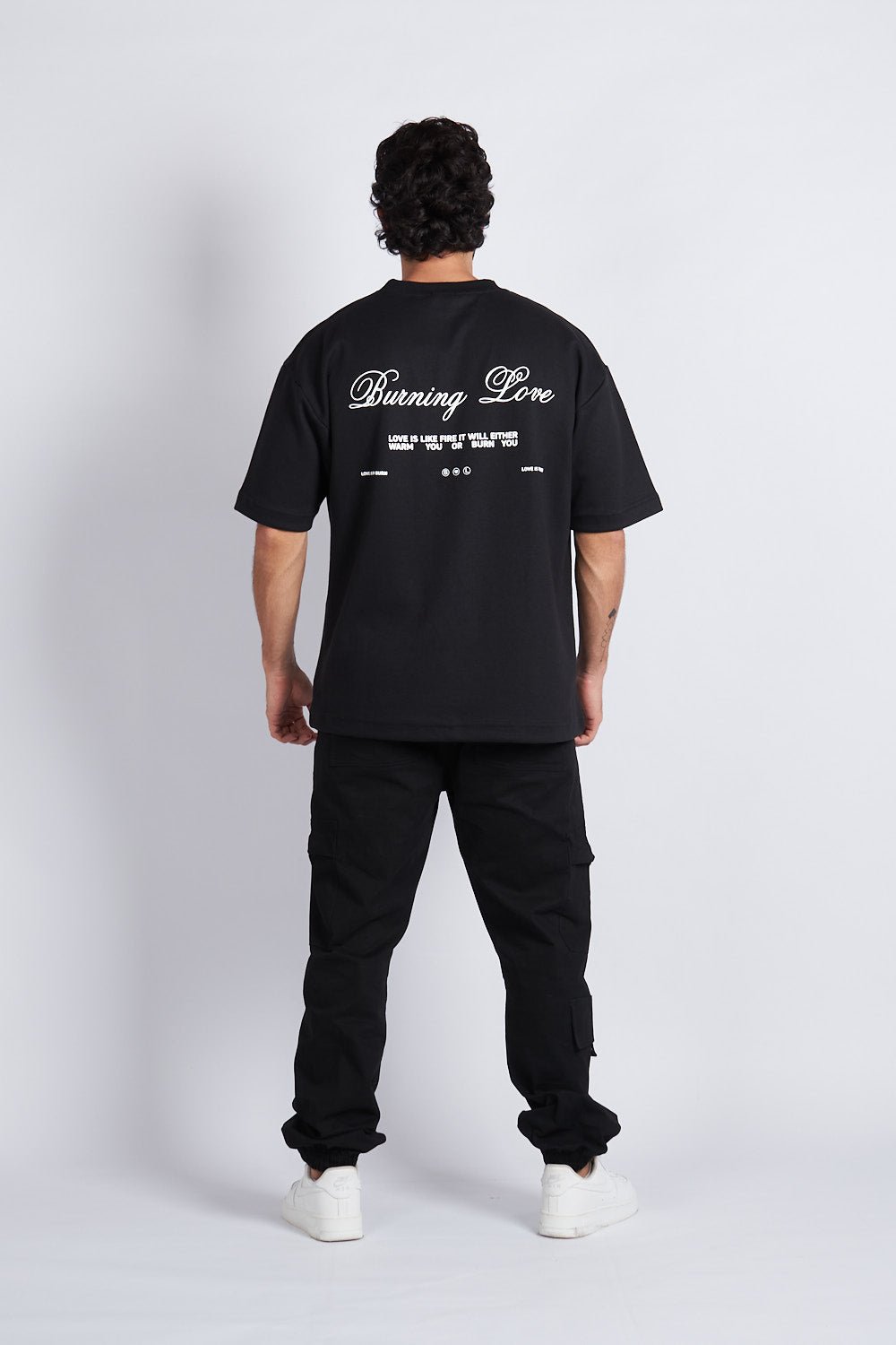 JOGGER CARGO CON PREENSES NEGRO - REDUX CLUB